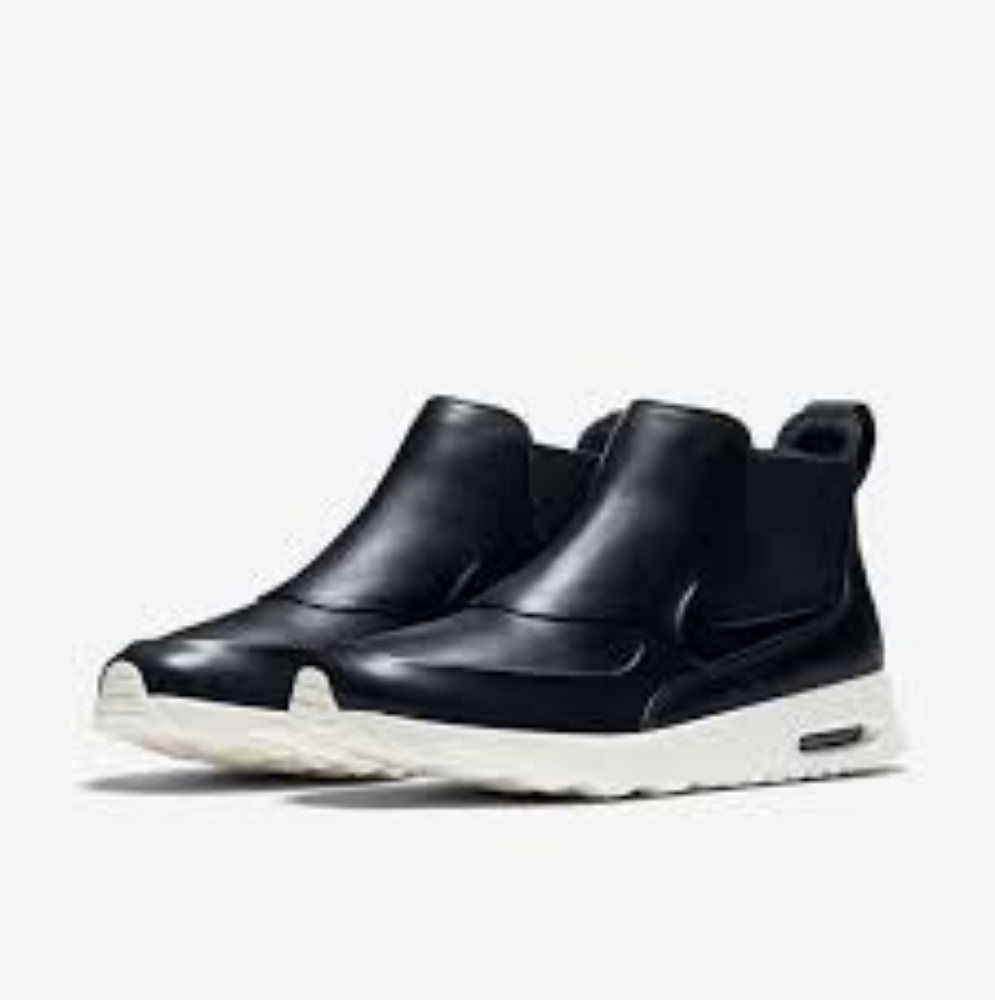 Nike Women's Black Slip-On Athletic Shoes with White Sole